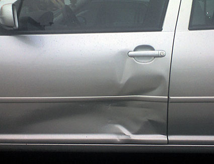 Katelyn's Damaged Door